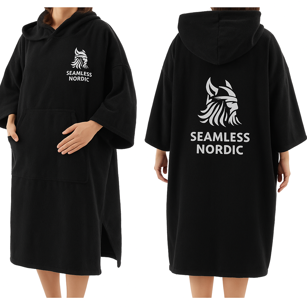 Black poncho with 'Seamless Nordic' logo on a white background